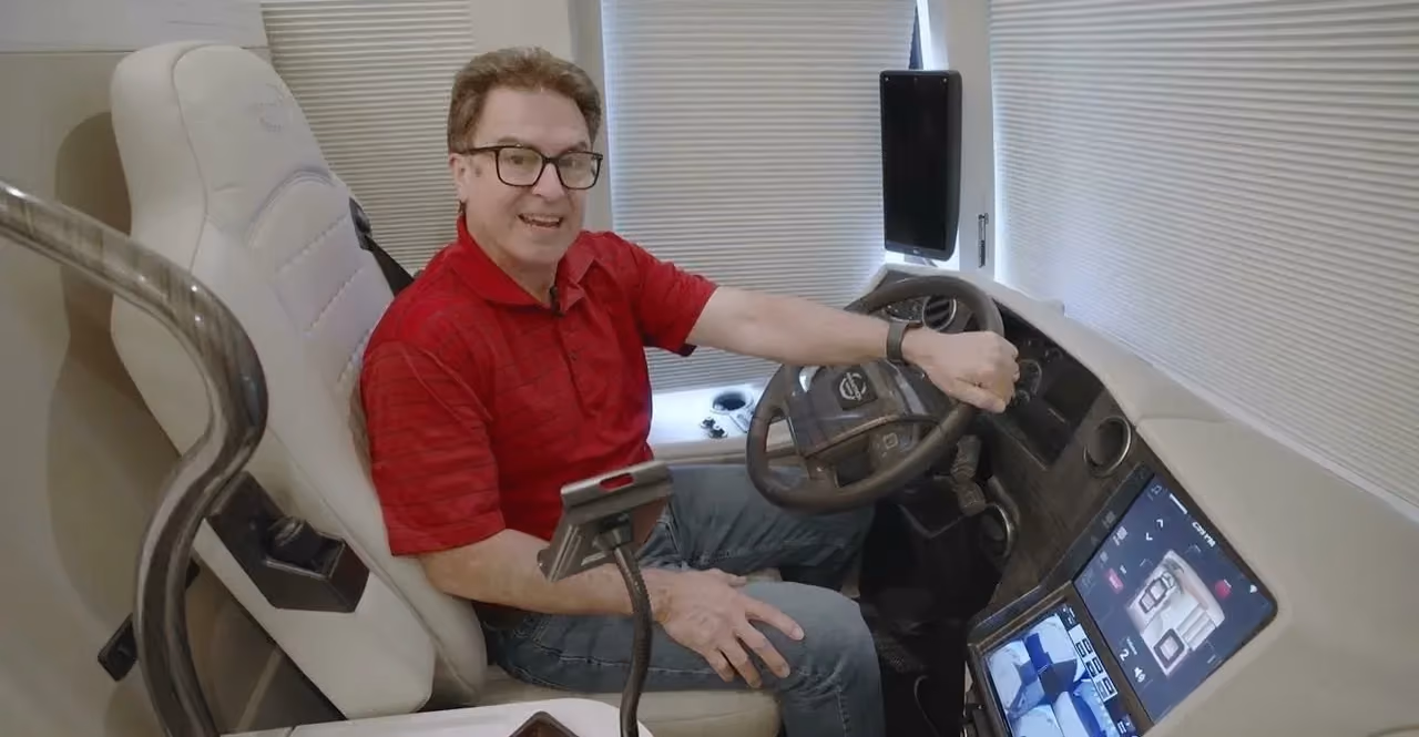 Jay Graham shows off the new Prevost H3-45 Vanity Mirrors