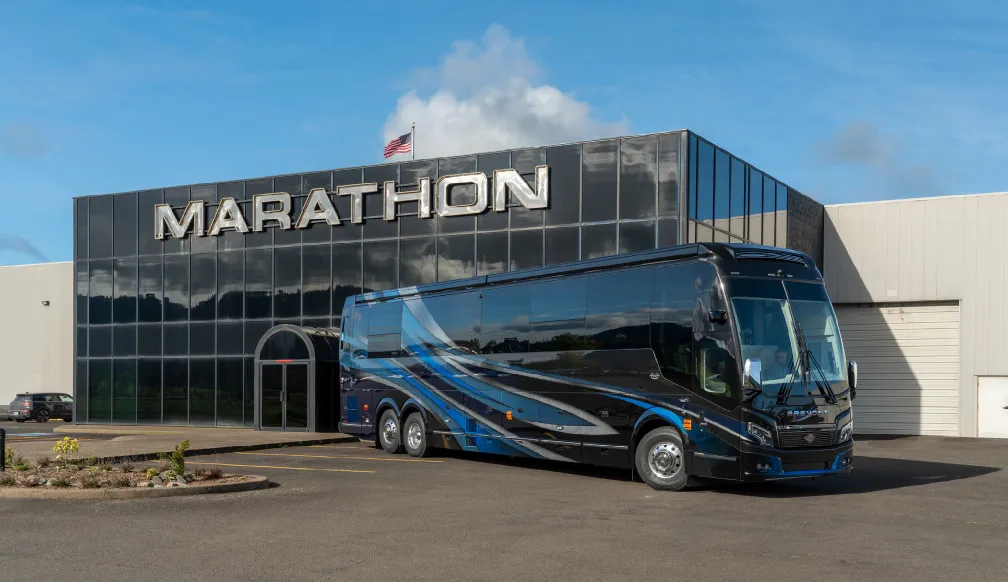 Marathon Coach Headquarters with Marathon Coach 1387 parked outside
