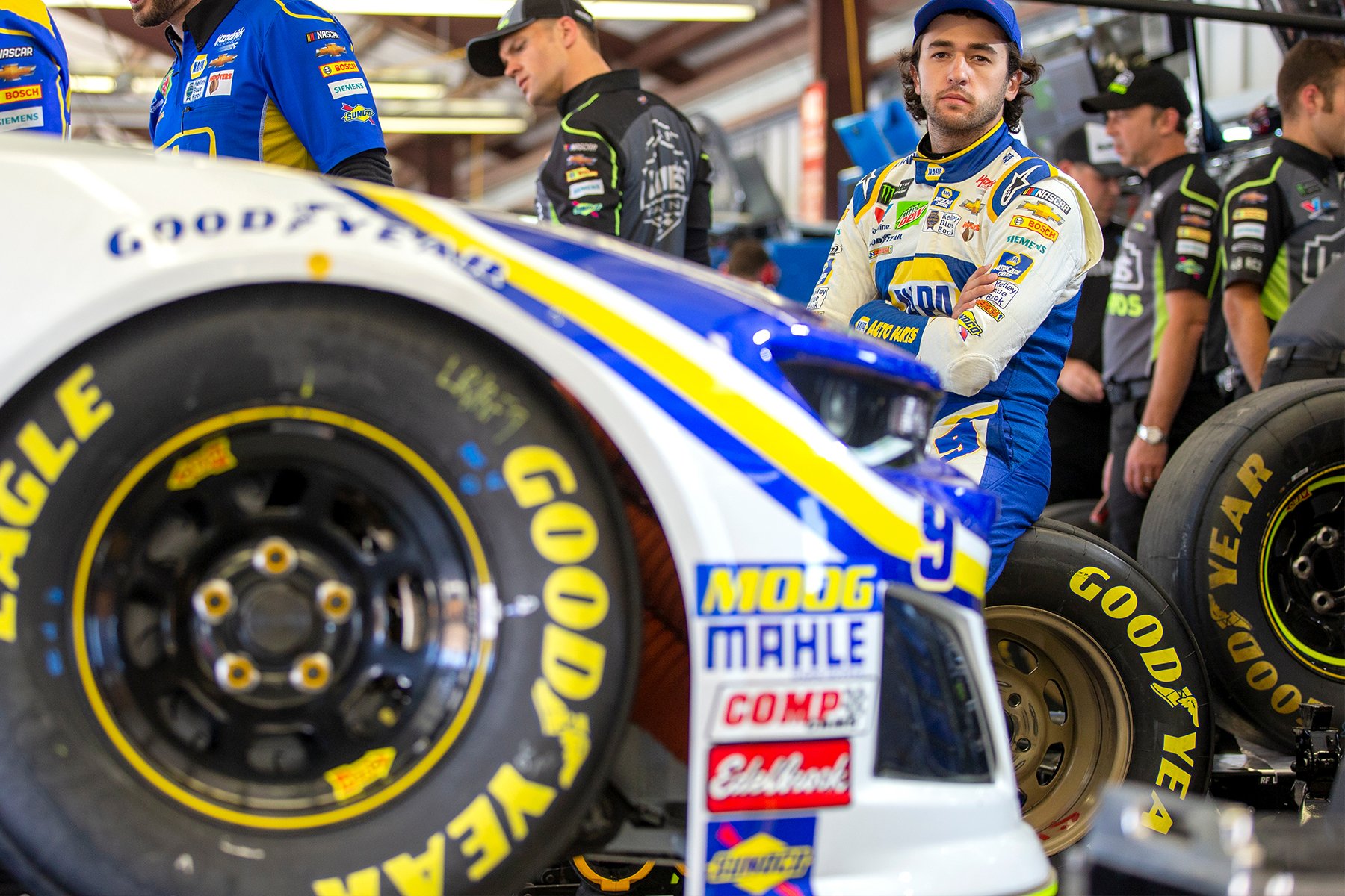 Chase Elliott (24) hangs out in the garage during practice for the Bass Pro Shops NRA Night Race at Bristol Motor Speedway in Bristol, Tennessee.
