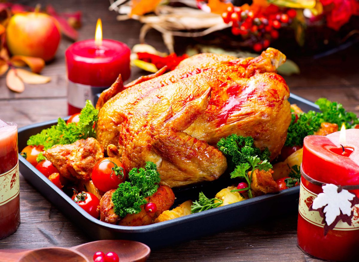 Thanksgiving Dinner. Roasted turkey garnished with Potato, Veget