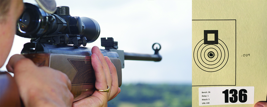 A person shooting a rifle at a gun range