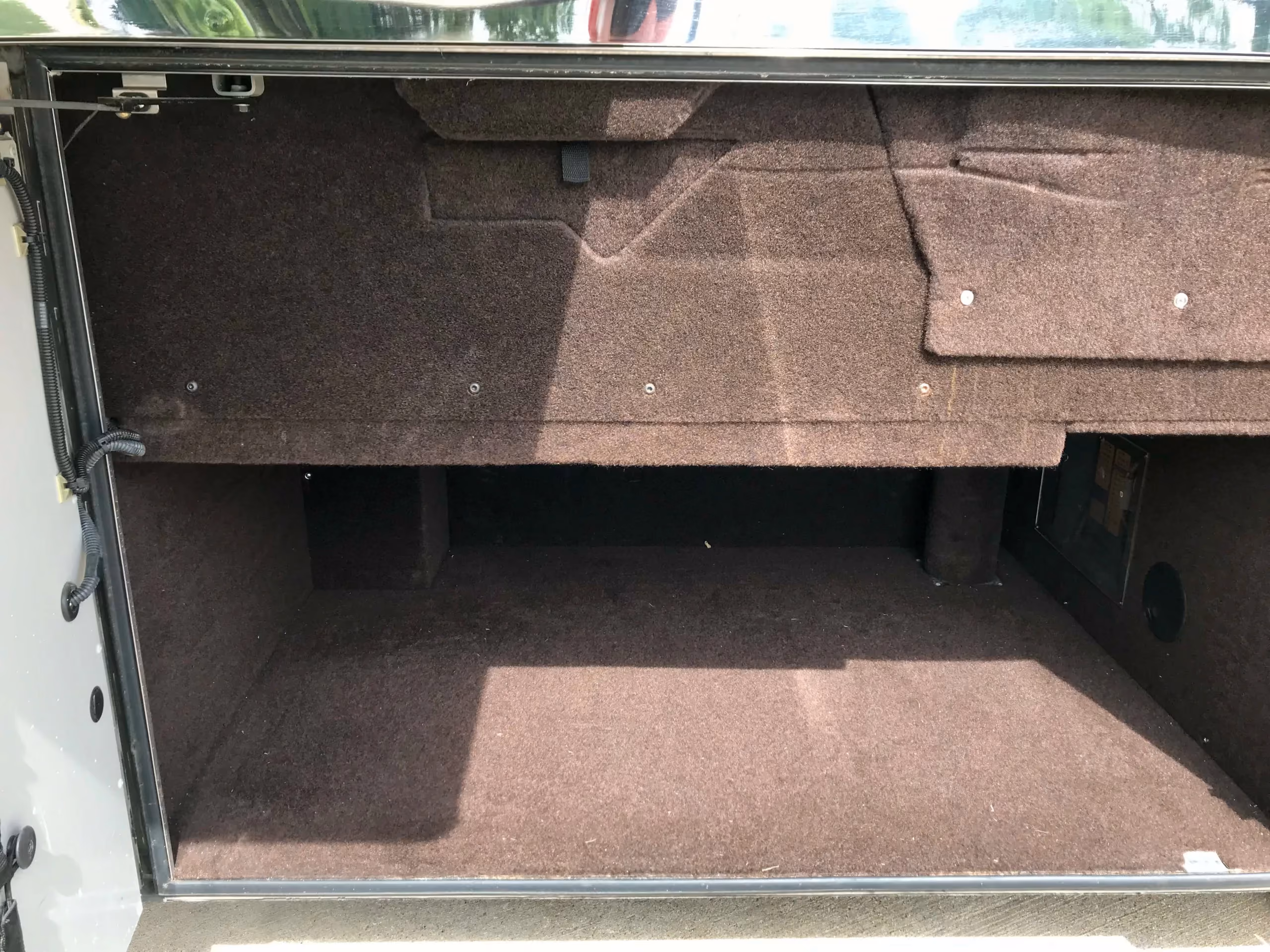 Storage interior close-up in Marathon Coach 0813