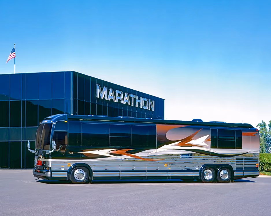 Exterior driver-side profile of 2006 Marathon Coach 0986 on Prevost XLV-45 chassis