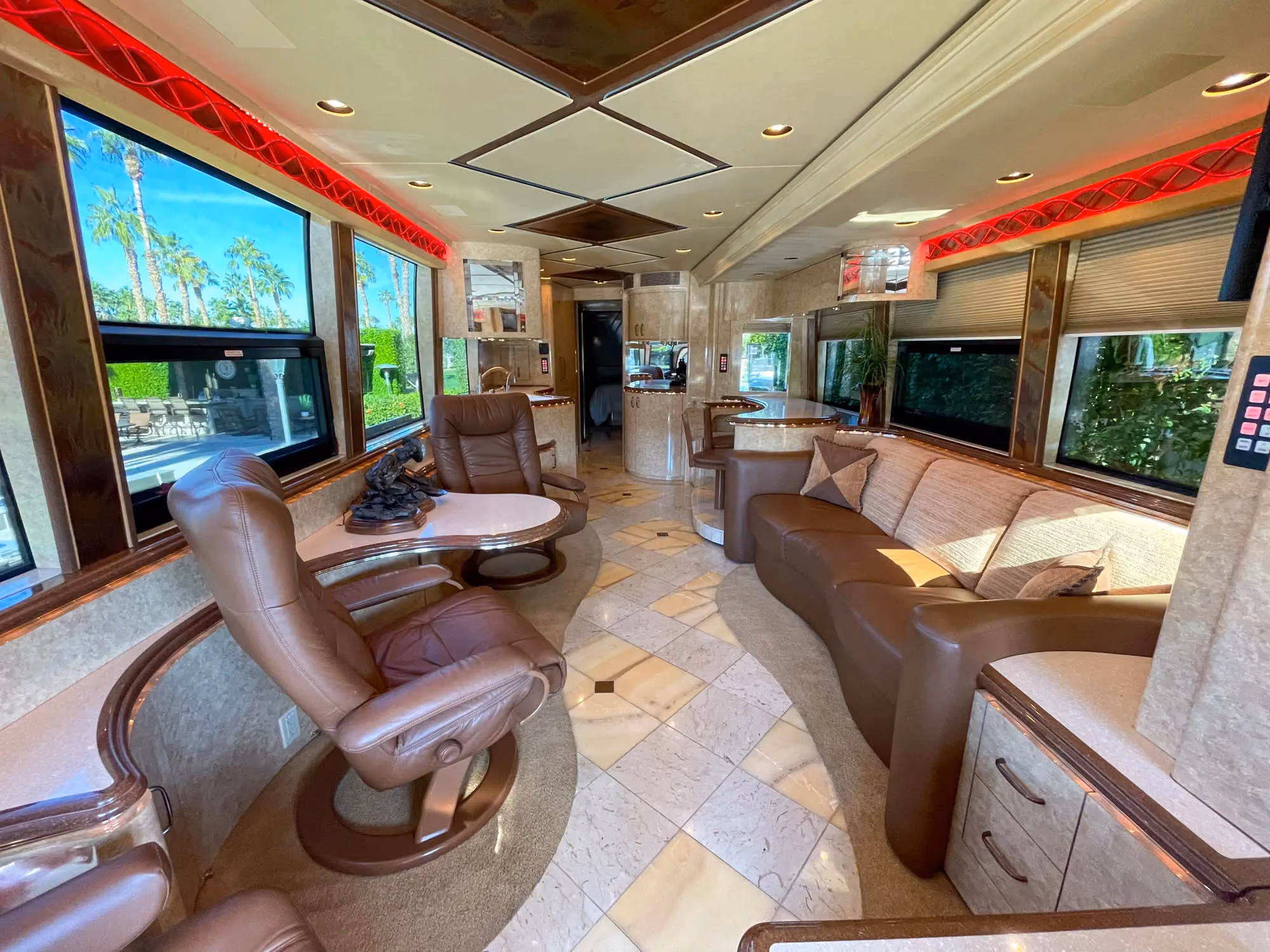 Interior living area with Crestron A/V controls in Marathon Coach 1083