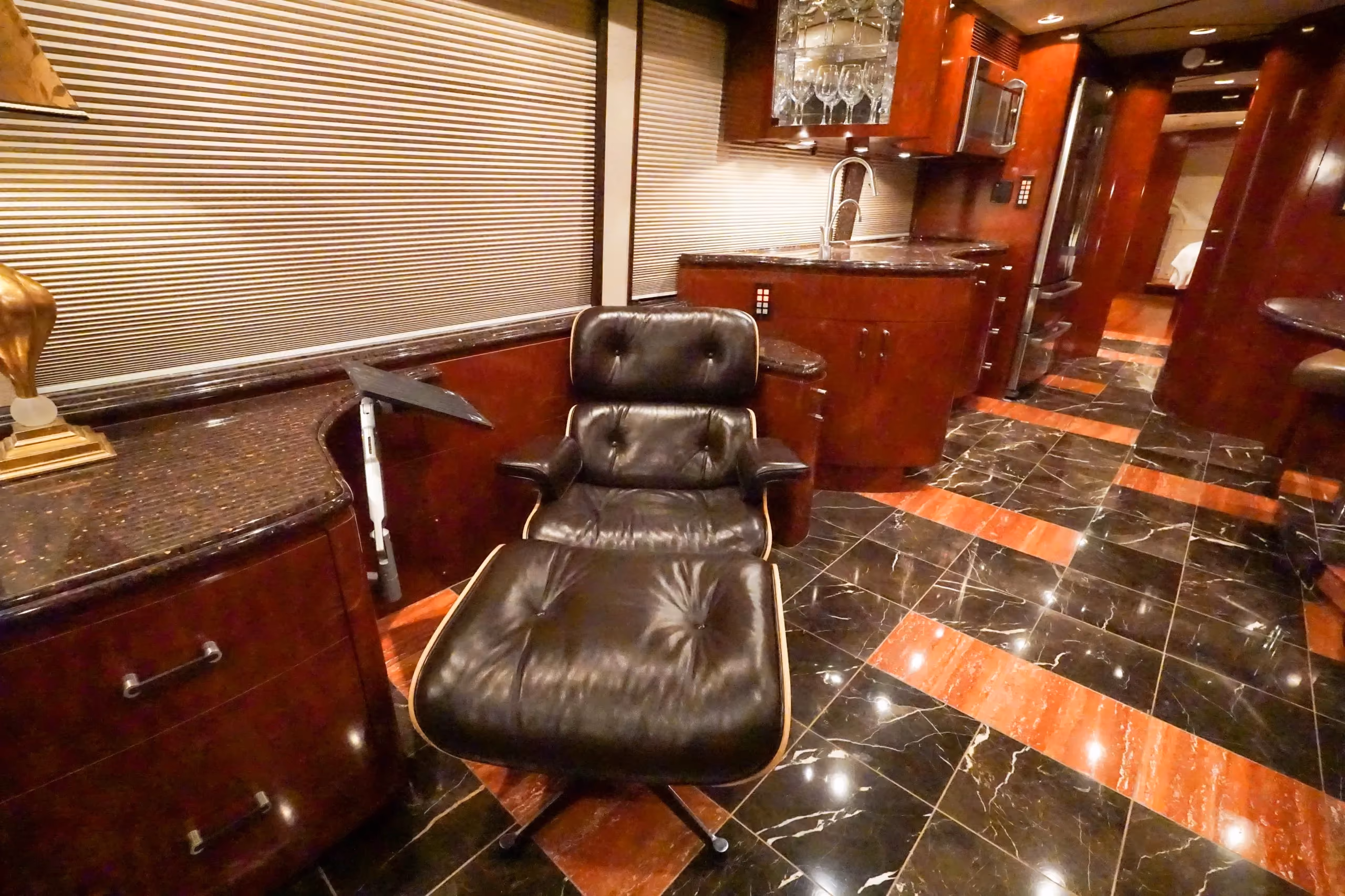 Interior galley kitchen with new Bosch refrigerator in Marathon Coach 1097