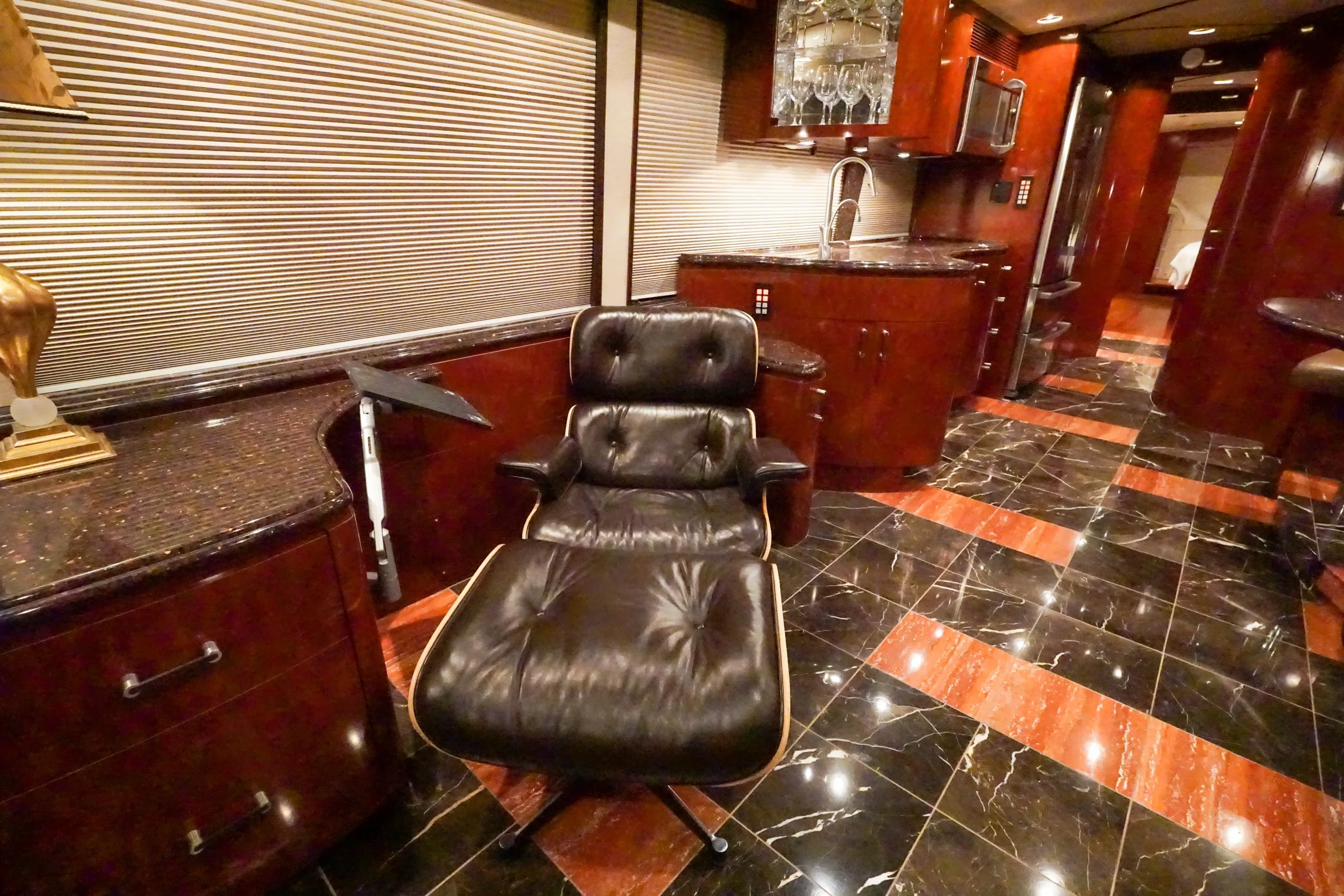 Interior galley kitchen with new Bosch refrigerator in Marathon Coach 1097