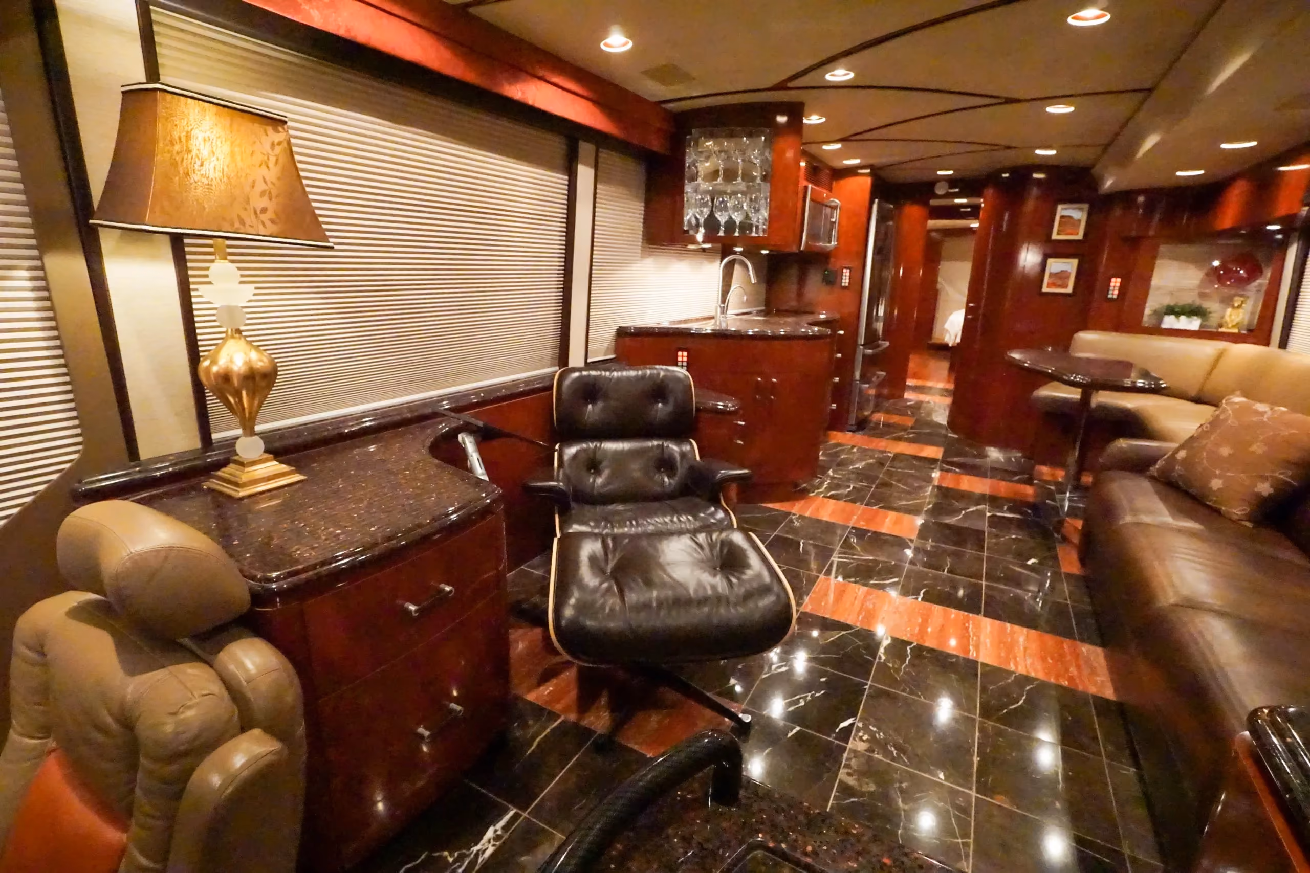 Interior salon cabinetry and Crestron A/V controls in Marathon Coach 1097