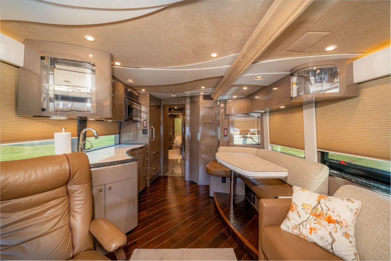 Interior salon cabinetry and Crestron A/V controls in Marathon Coach 1153
