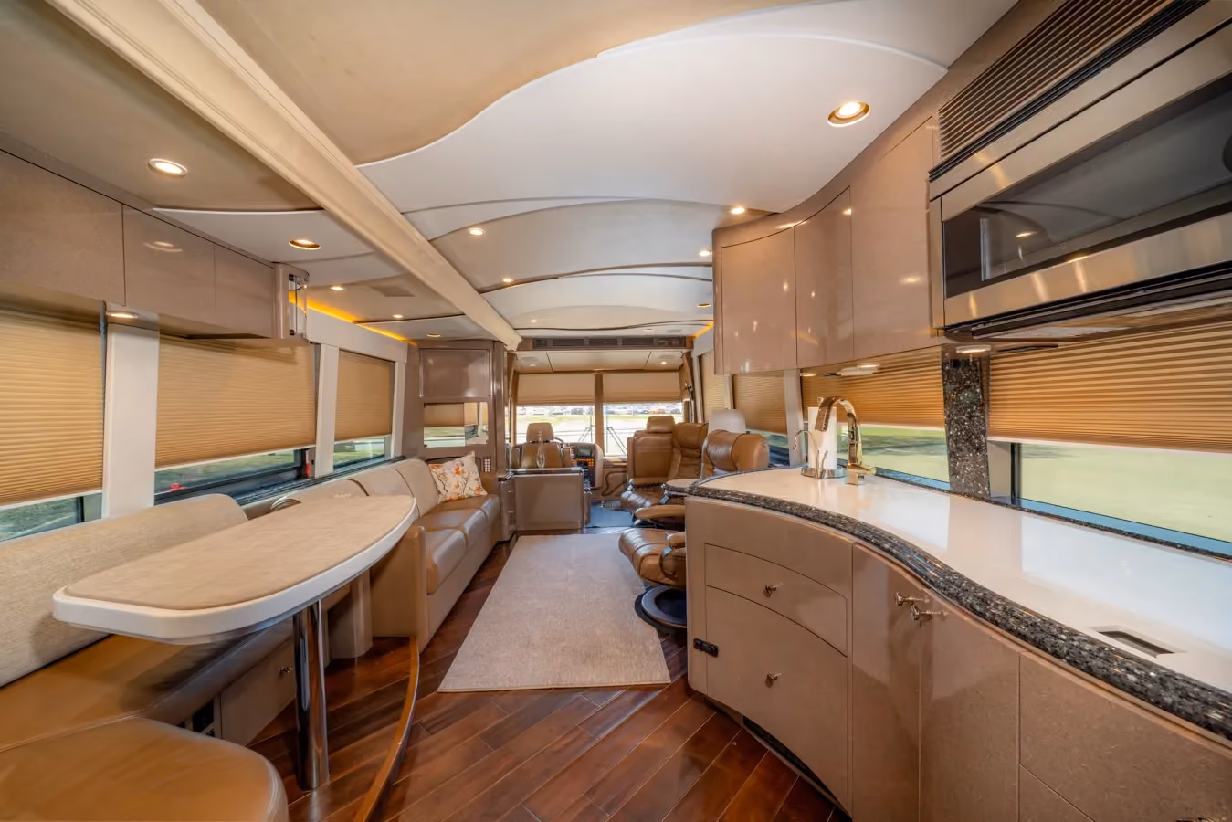 Interior bedroom with disappearing 32-inch flat screen TV in Marathon Coach 1153