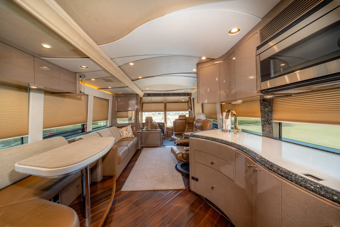 Interior bedroom with disappearing 32-inch flat screen TV in Marathon Coach 1153