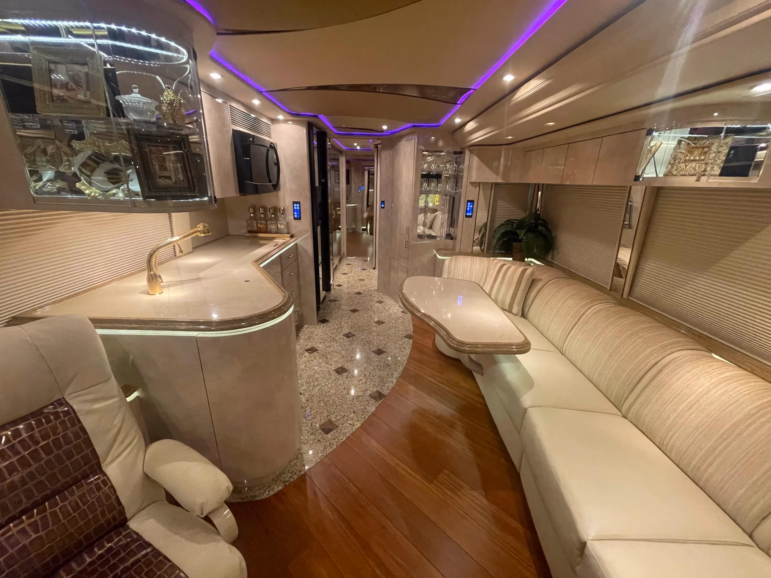 Interior living area seating with Crestron surround sound in Marathon Coach 1202