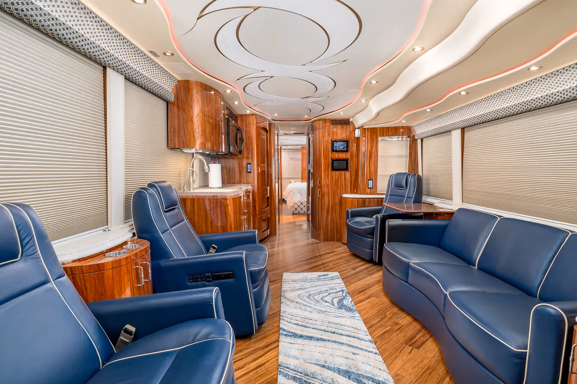 Interior salon of 2012 Marathon Coach 1205 with salon flat floor slide-out