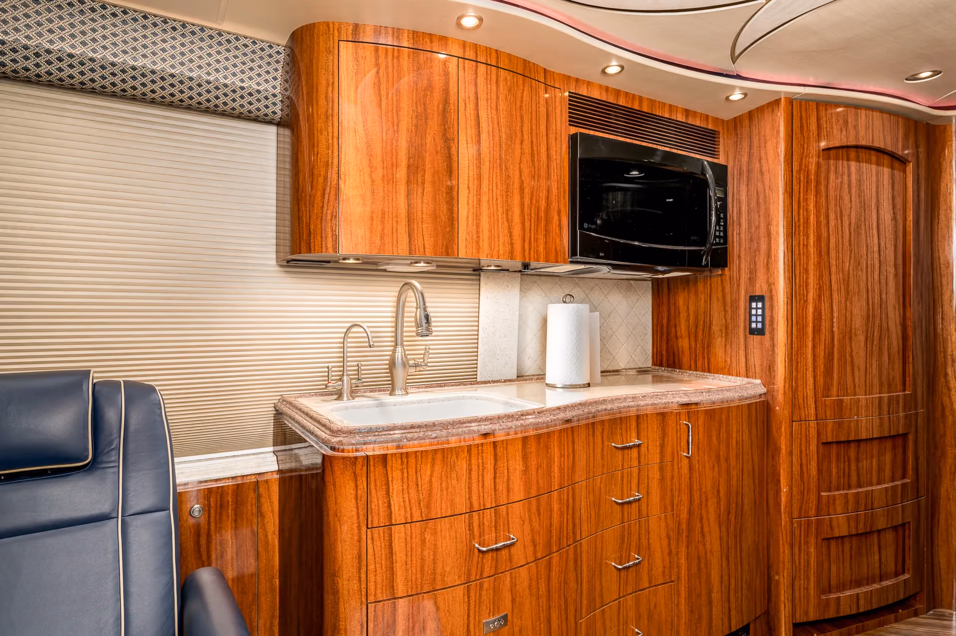 Interior salon cabinetry and finishes in Marathon Coach 1205