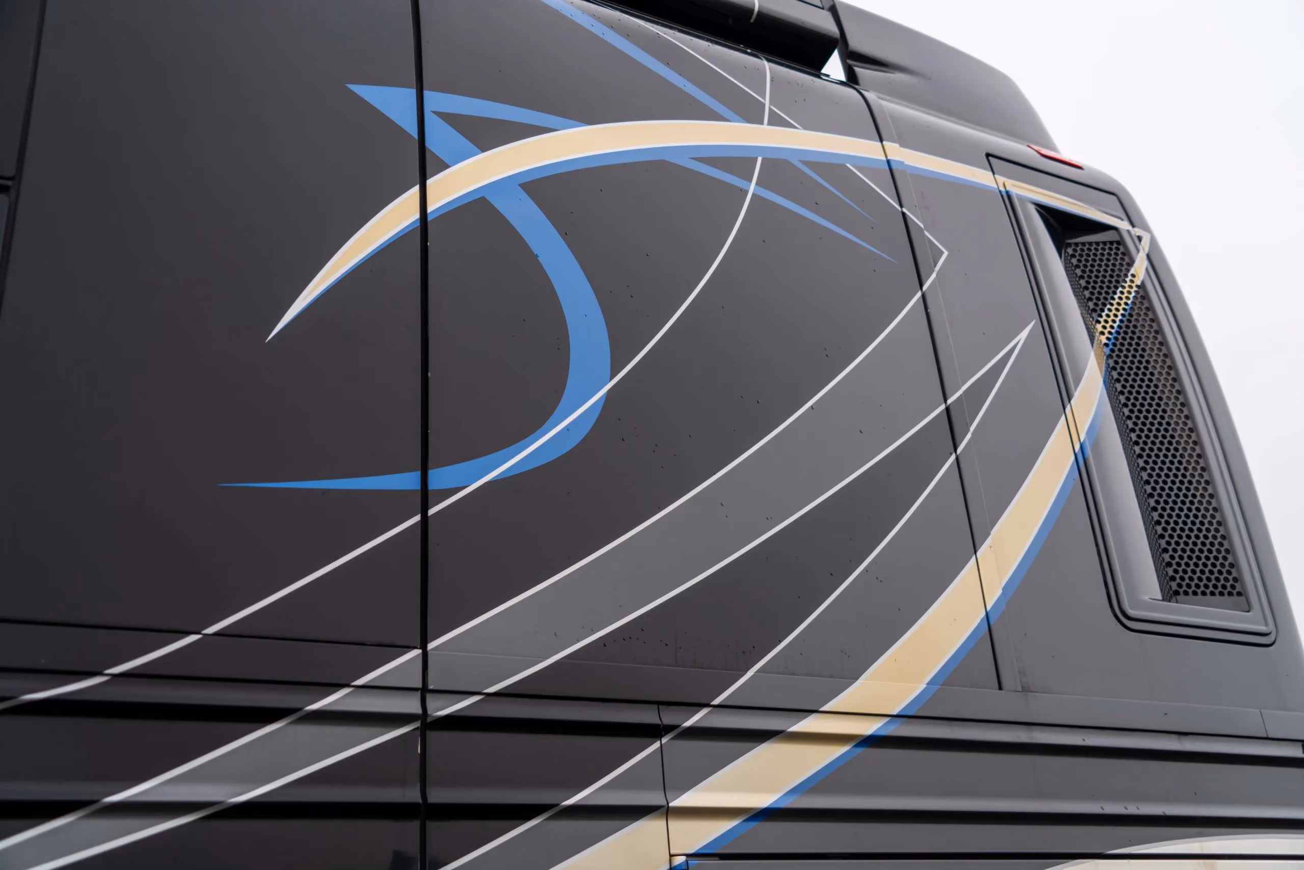 Interior wardrobe with stacked washer and dryer close-up in Marathon Coach 1216