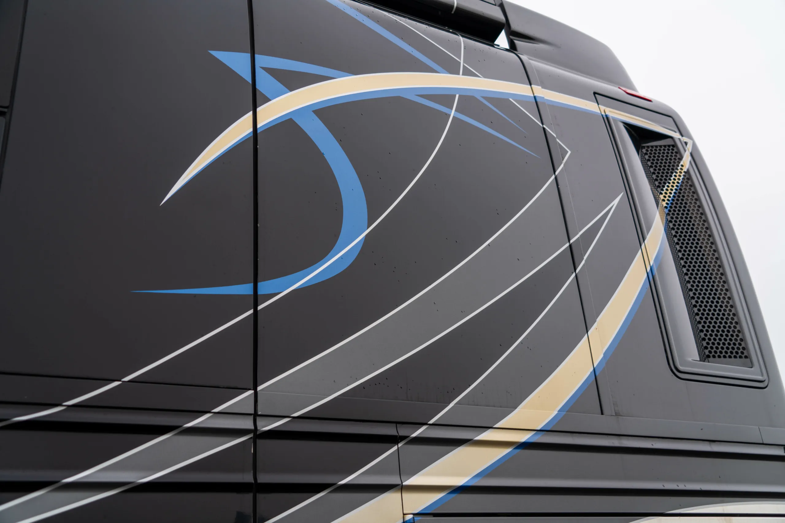 Interior wardrobe with stacked washer and dryer close-up in Marathon Coach 1216