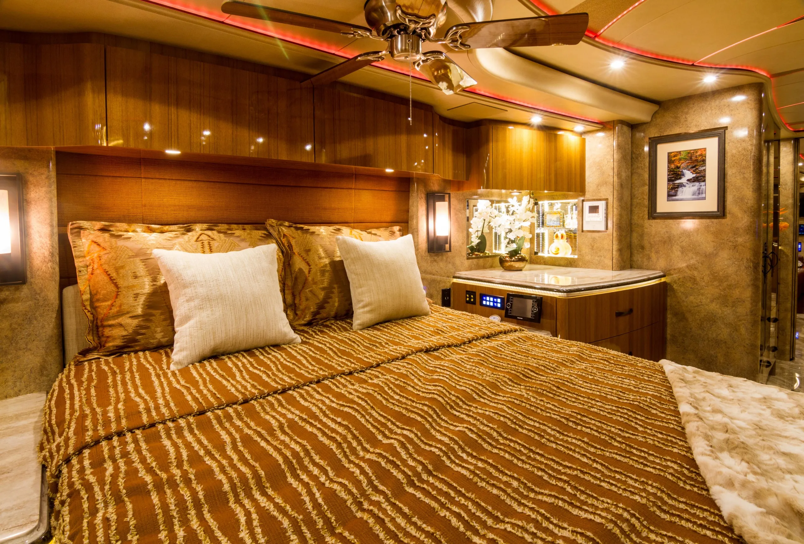 Interior mid-coach bathroom with shower in Marathon Coach 1221