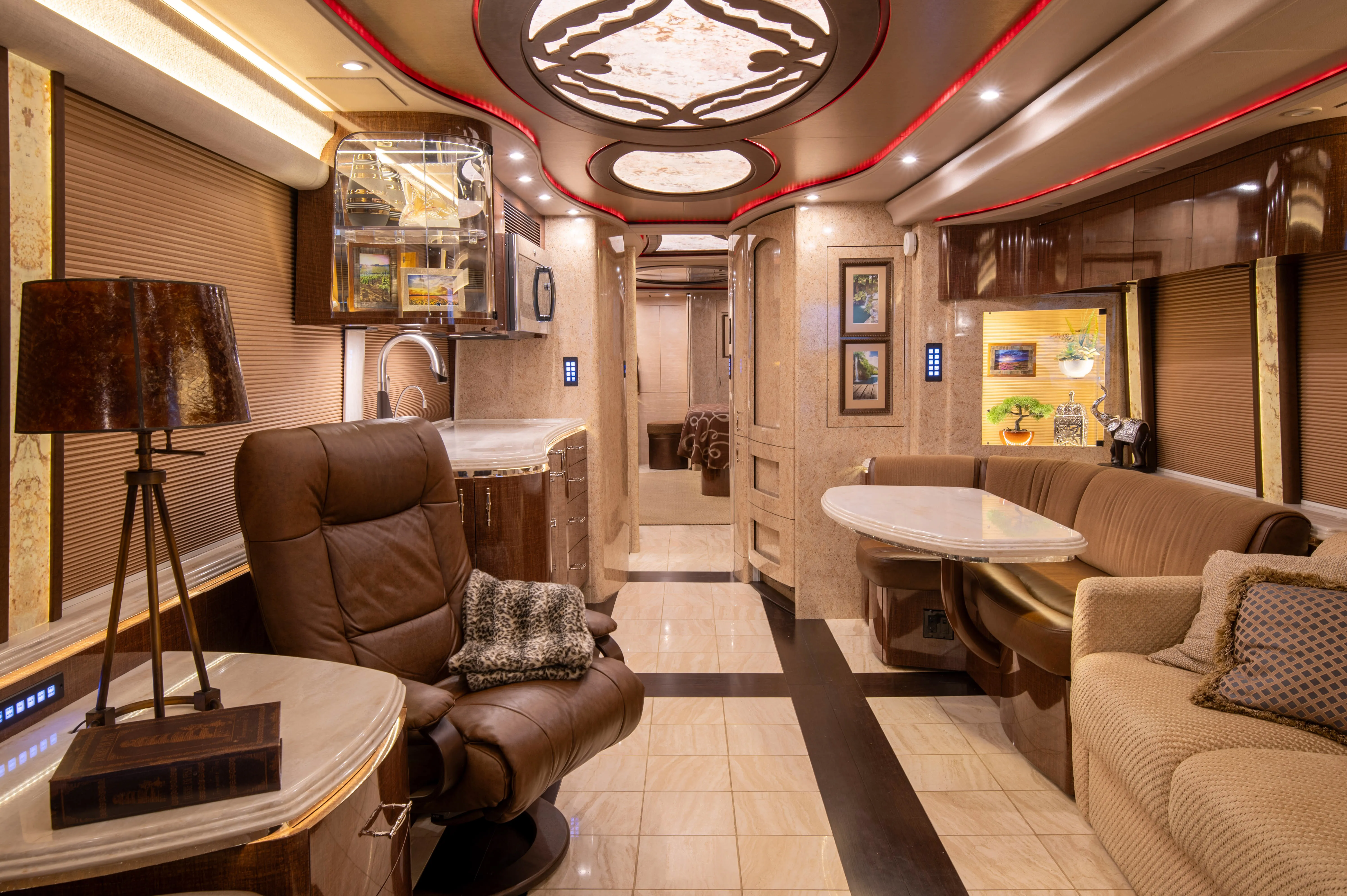 Interior salon of 2015 Marathon Coach 1219 with double-slide expanded