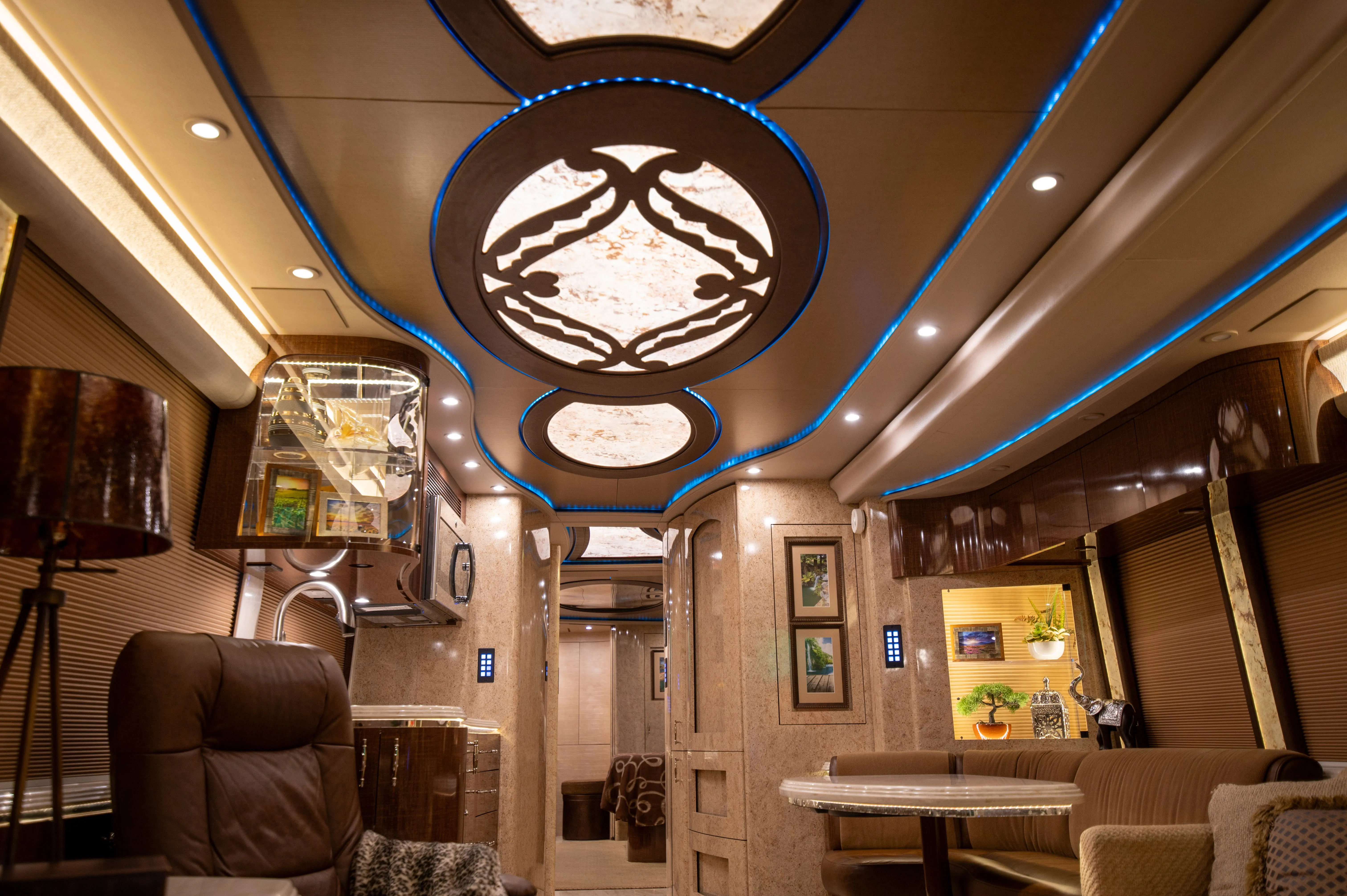 Exterior of 2015 Prevost H3-45 Marathon Coach 1219 with ground effects lighting
