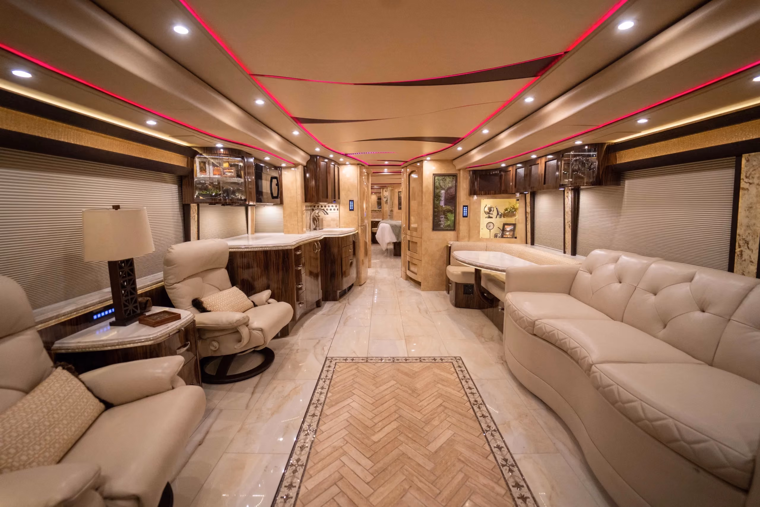 Interior salon of 2016 Marathon Coach 1241 with Crestron A/V and surround sound