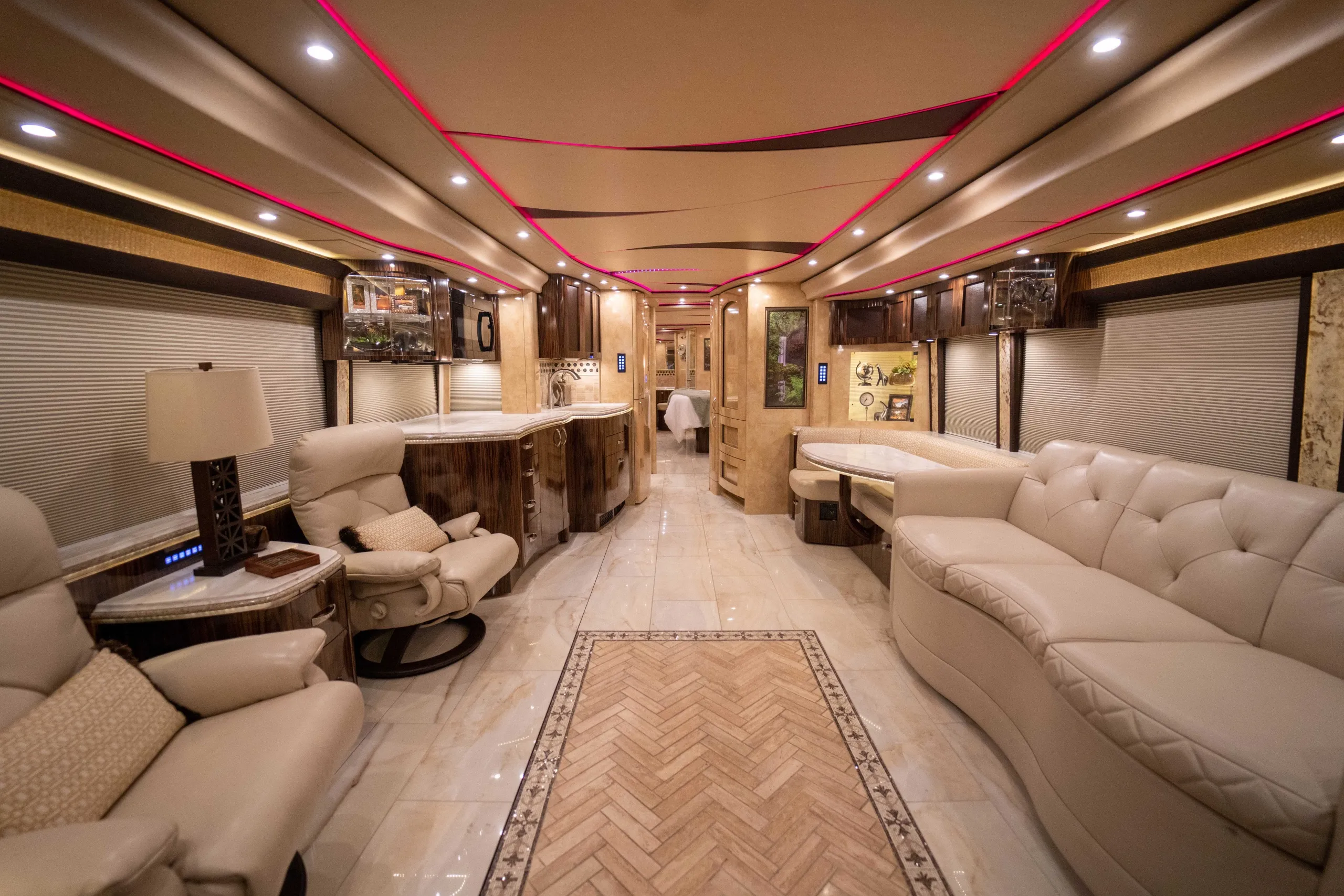 Interior salon of 2016 Marathon Coach 1241 with Crestron A/V and surround sound