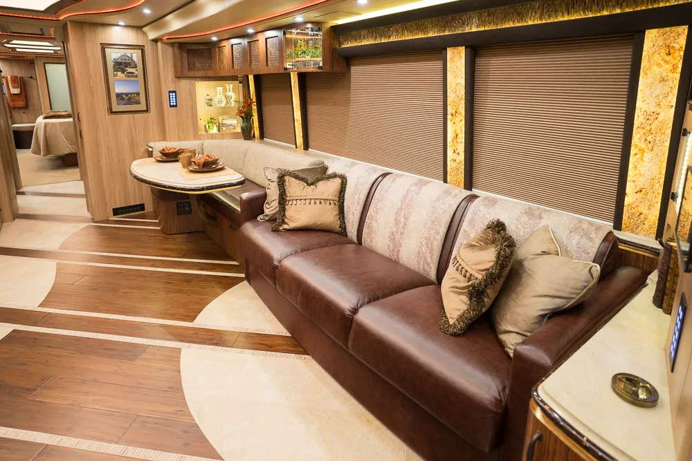 Interior salon of 2018 Marathon Coach 1275 with Crestron A/V and surround sound