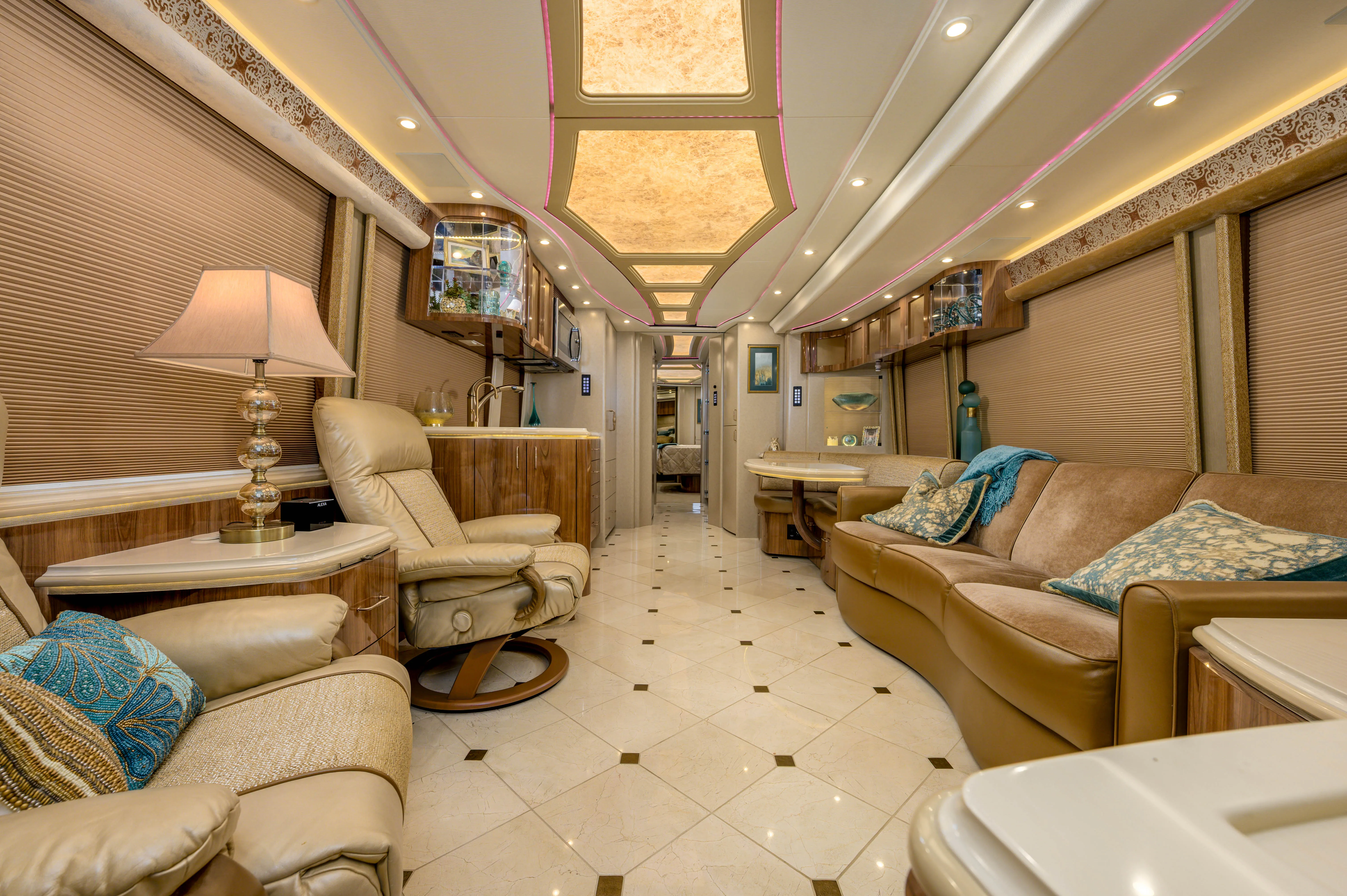 Interior salon of 2019 Marathon Coach 1288 with Crestron Smart Graphics and surround sound