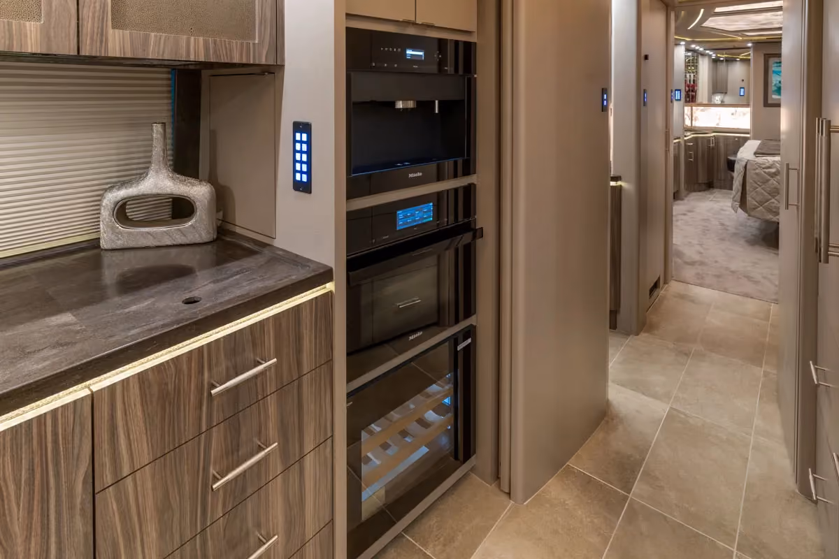 Interior galley countertop and cabinetry in Marathon Coach 1303