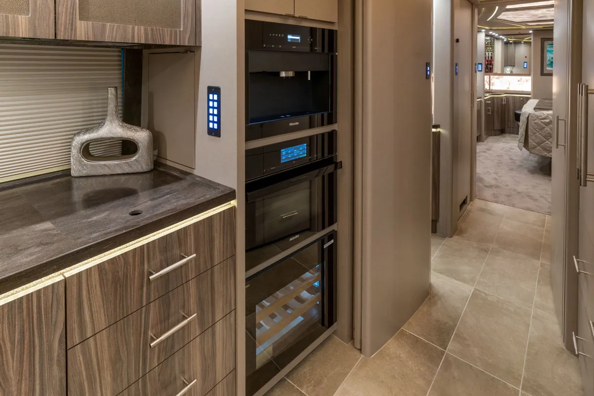 Interior galley countertop and cabinetry in Marathon Coach 1303