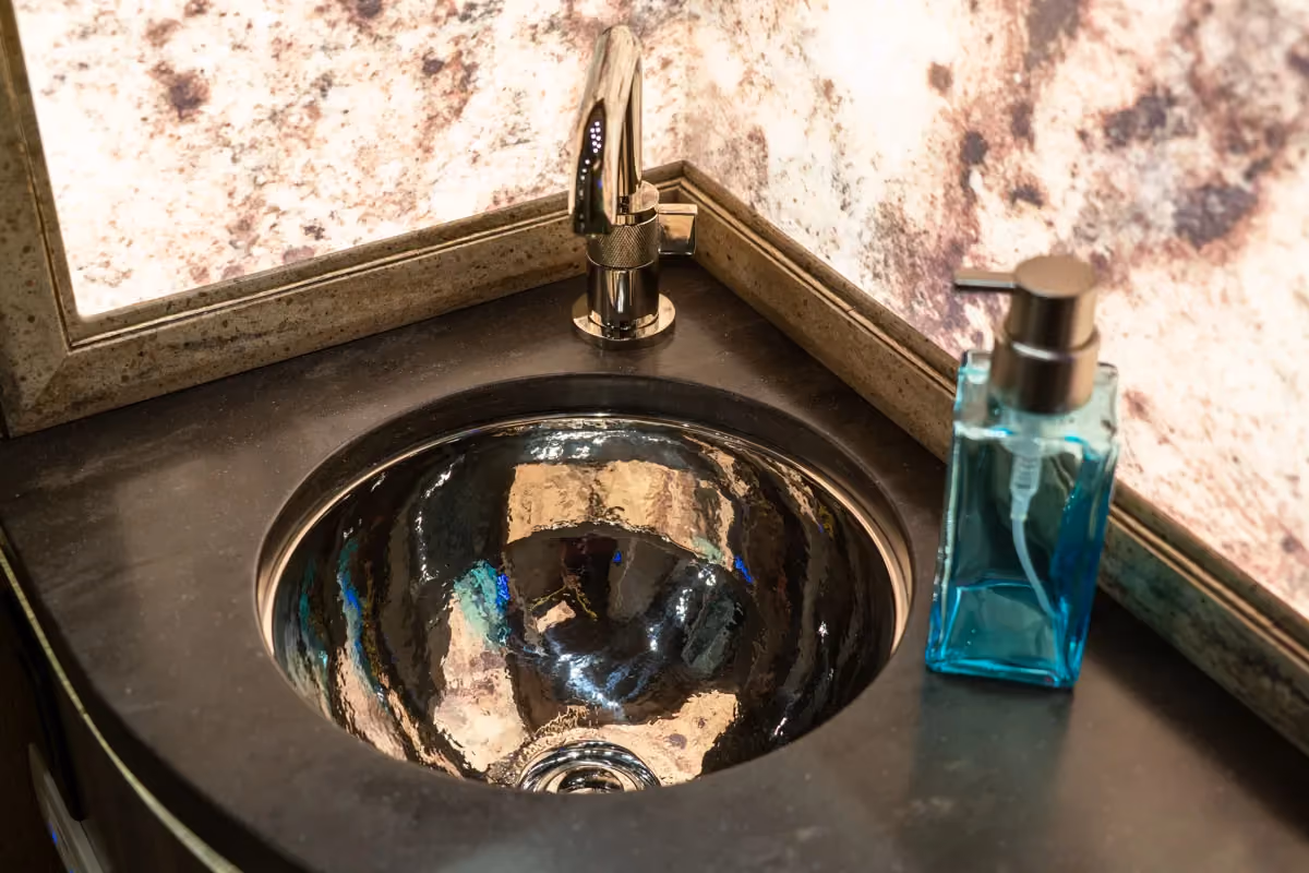 Interior bathroom vanity of Marathon Coach 1303