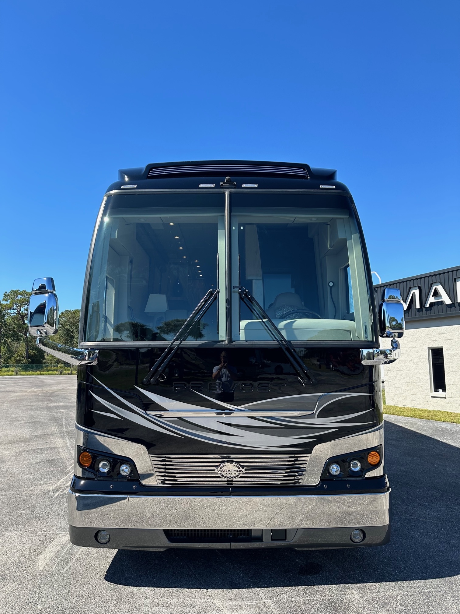 Exterior side view of 2021 Marathon Coach 1330