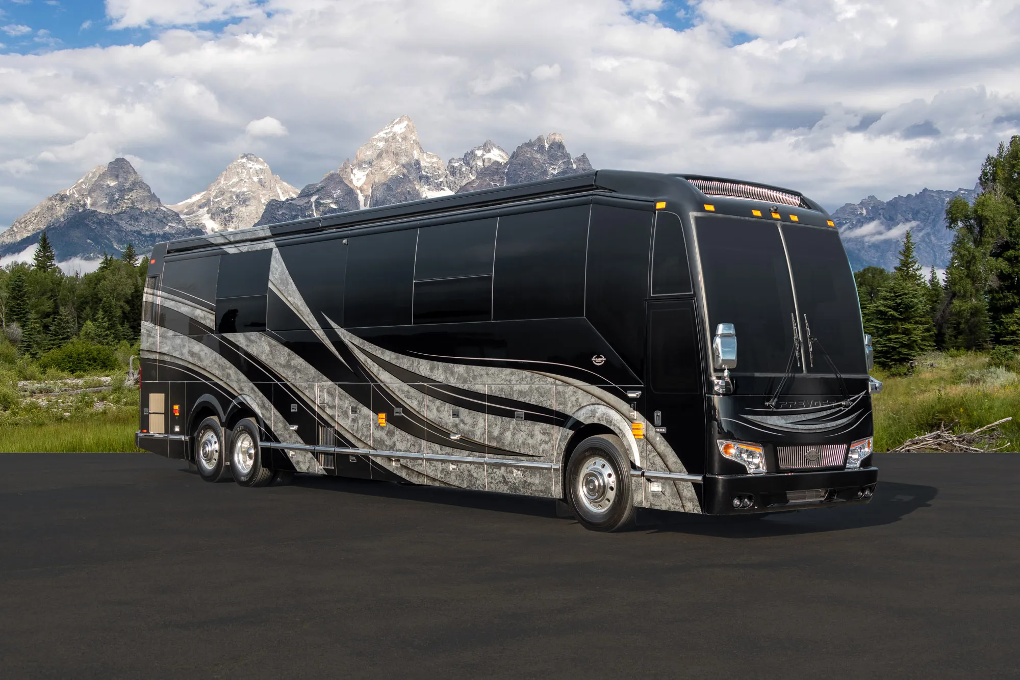 Exterior glamour shot of 2022 Marathon Coach 1345 with charcoal, black and silver paint design