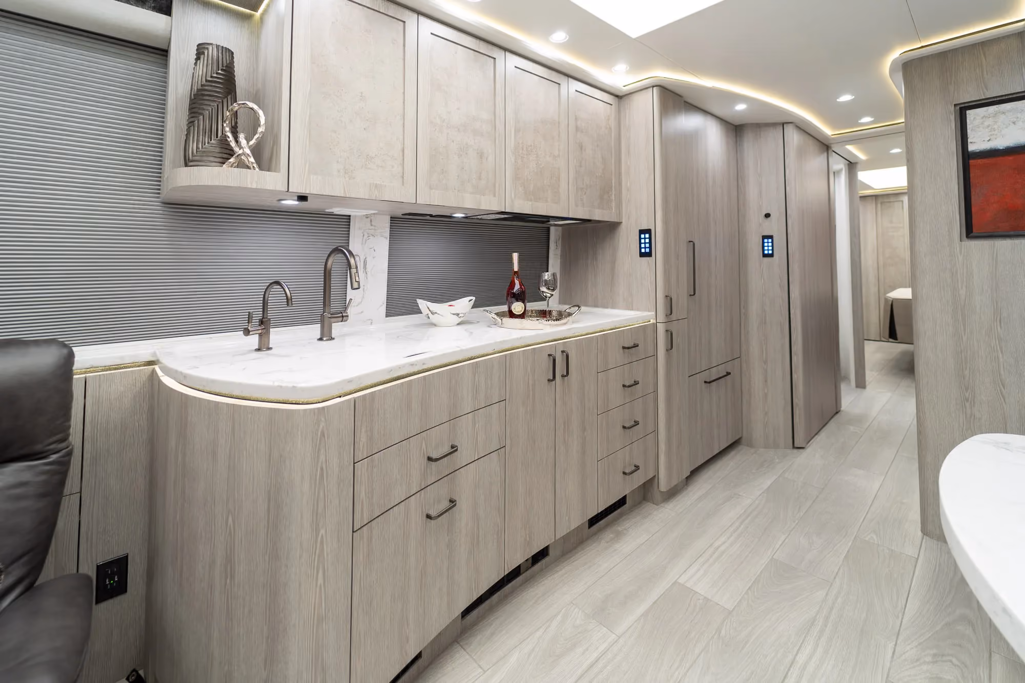 Interior galley countertop and cabinetry in Marathon Coach 1346