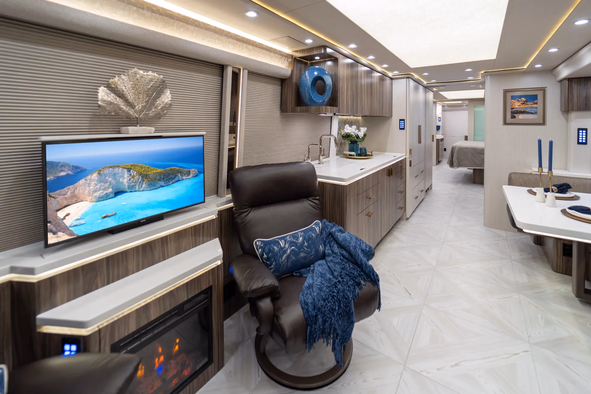 Interior living area of Marathon Coach 1348 with triple-slide open floor plan