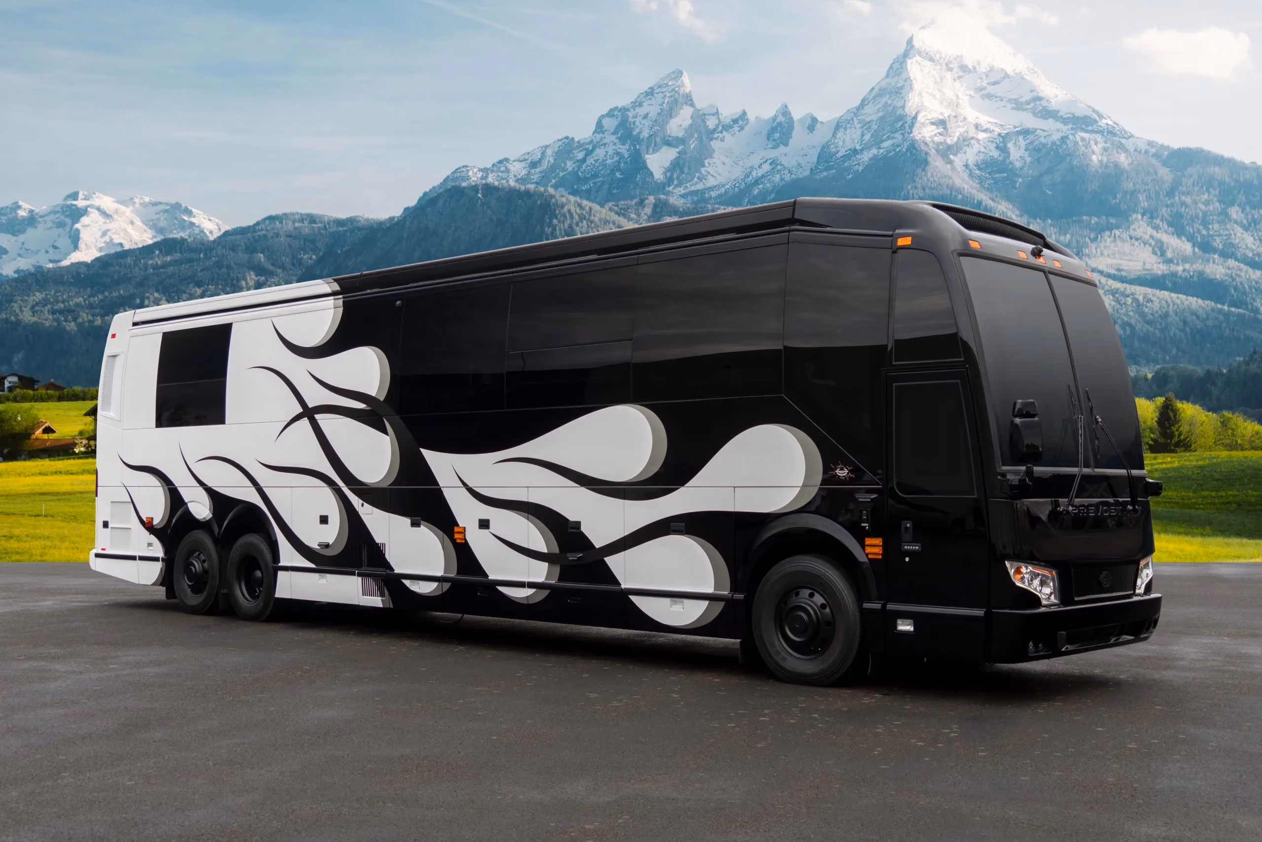 Exterior glamour shot of 2022 Marathon Coach 1351 on Prevost H3-45 chassis with playful custom paint design