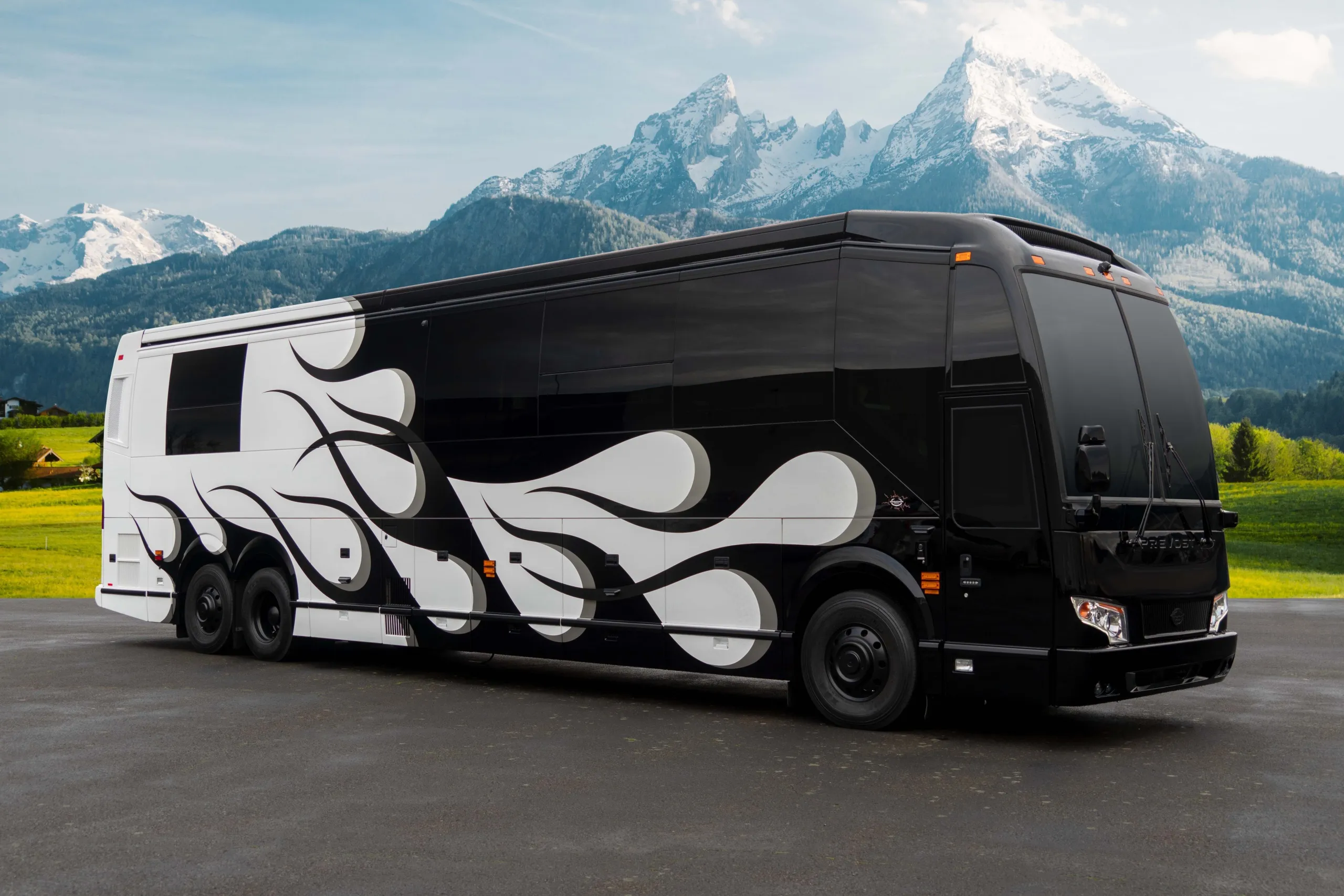 Exterior glamour shot of 2022 Marathon Coach 1351 on Prevost H3-45 chassis with playful custom paint design