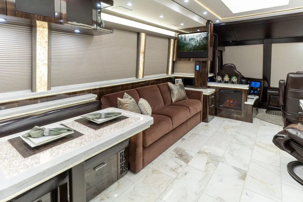 Exterior side view of 2022 Marathon Coach 1353 on Prevost X3-45 chassis