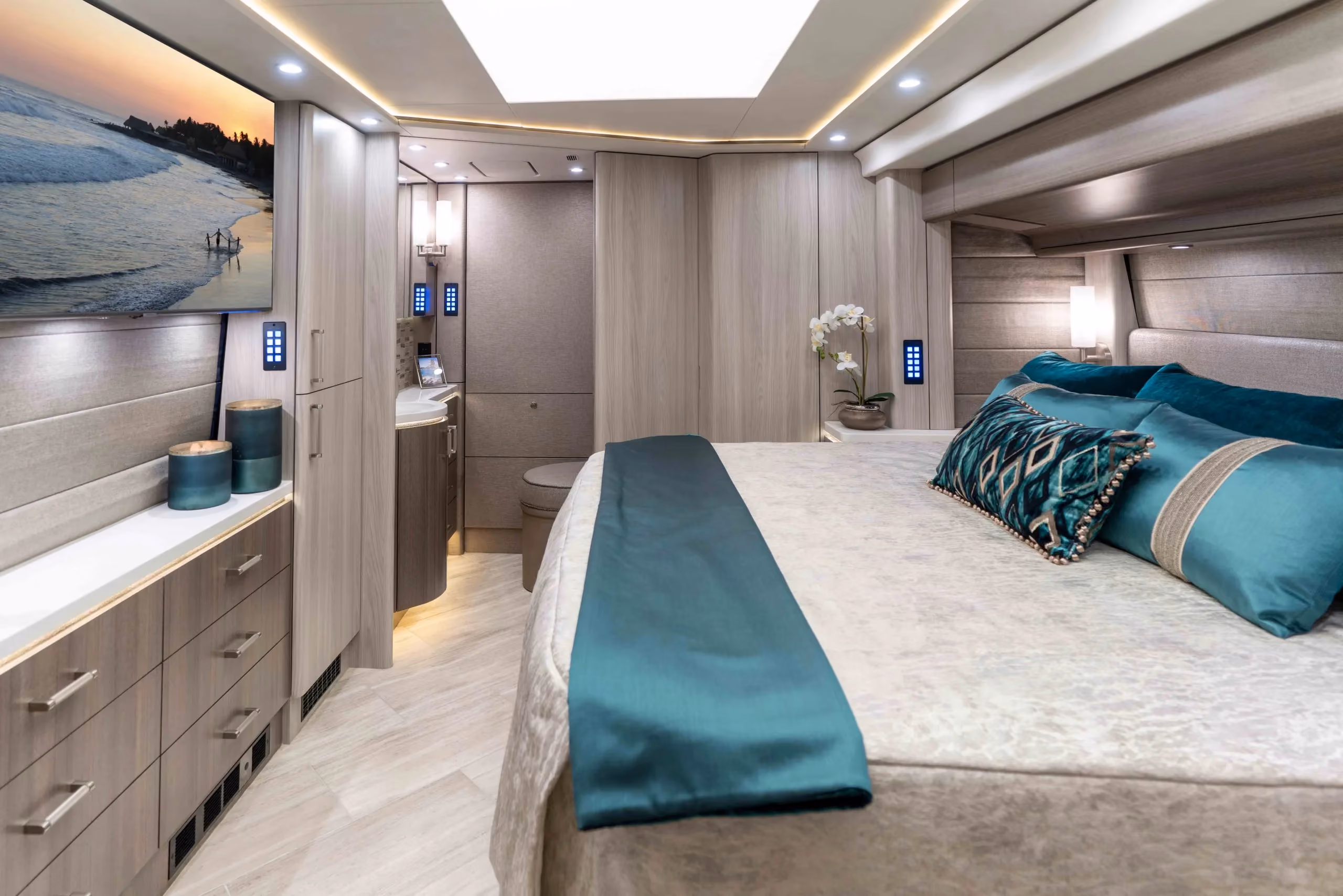 Interior sleeping area with stacked washer and dryer in Marathon Coach 1352