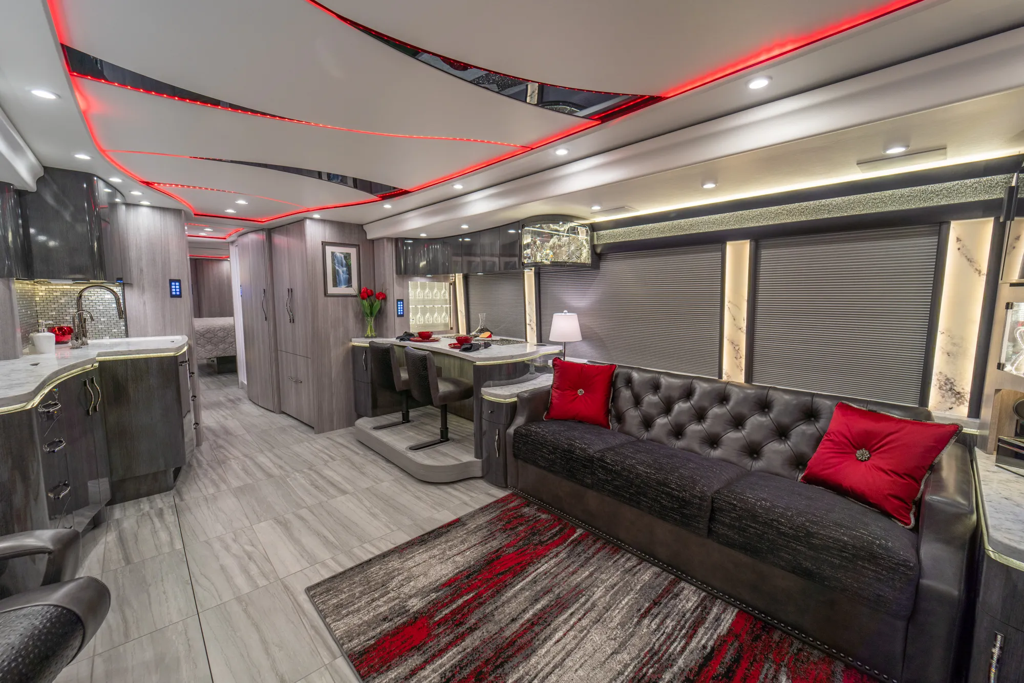 Interior living area of Marathon Coach 1354 with triple-slide open floor plan