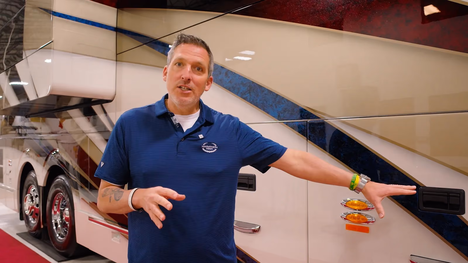 Sales Rep Mal Williams gives a walk-through tour of a custom-built marathon coach