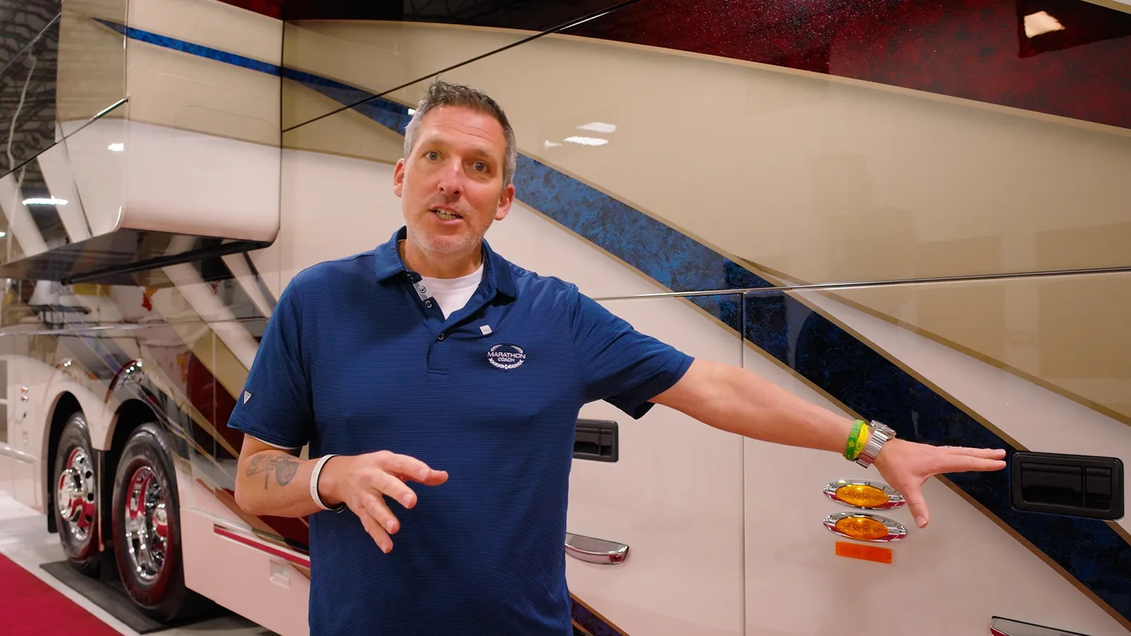 Sales Rep Mal Williams gives a walk-through tour of a custom-built marathon coach