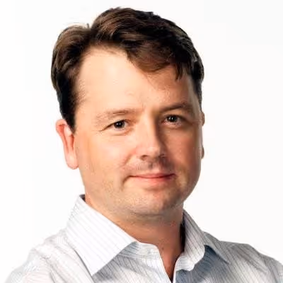 Headshot of Angel Investor Robert Nicholls in front of white background