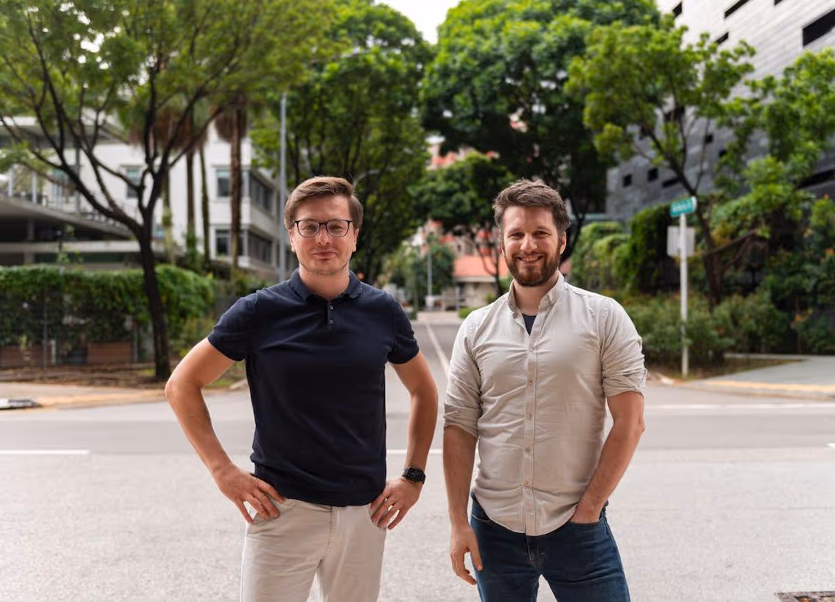Workclass CEO and CTO Stephan Bruggemann pose outside together smiling