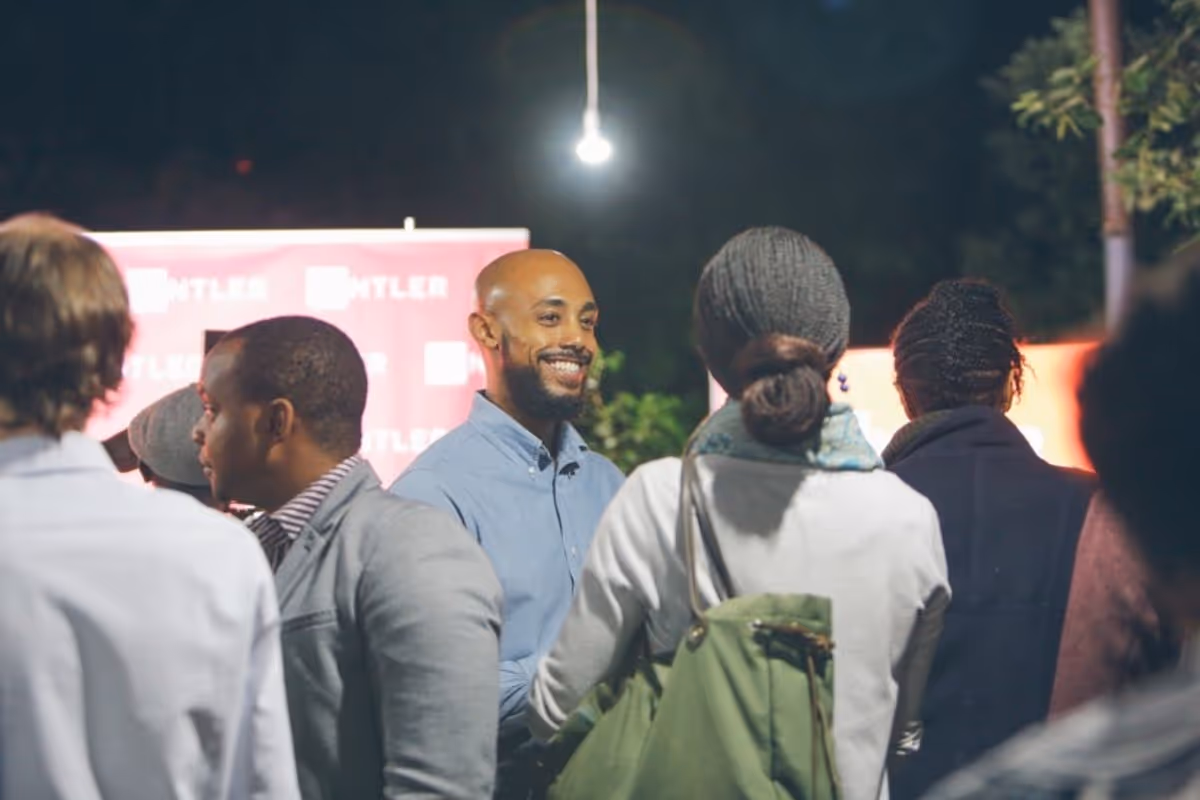 Man smiling among the crowd at Antler East Africa Launch Event