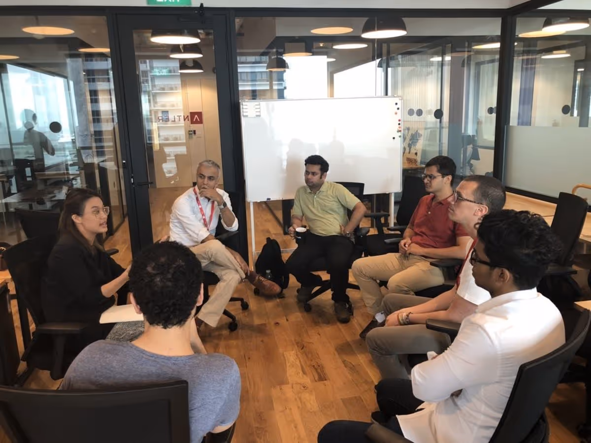 People sitting in circle having discussion for Antler Cohort 