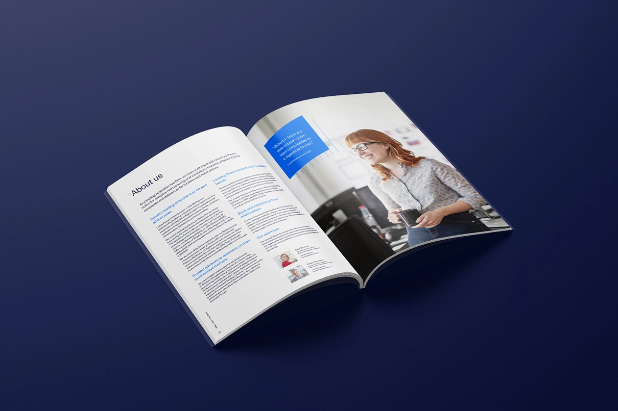 Gilbert and Tobin's updated brand identity applied to pages of a magazine.