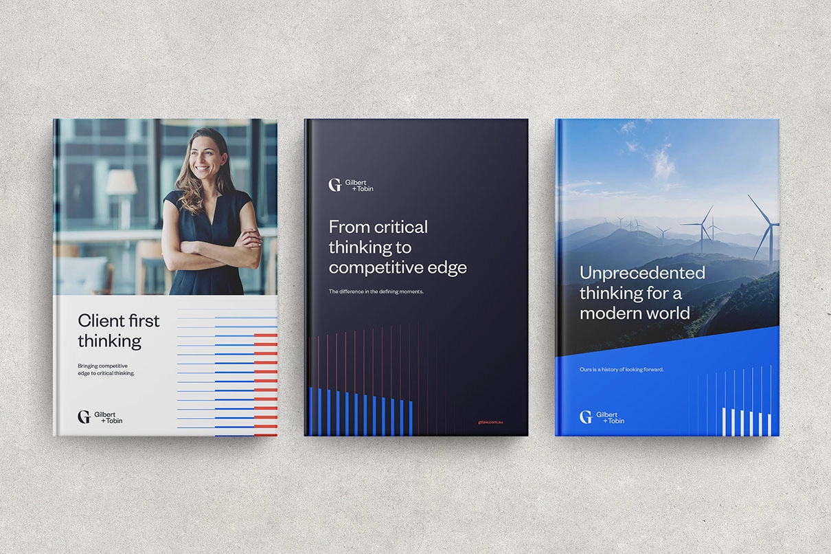 Gilbert and Tobin’s updated brand identity shown across three variations of a magazine cover design.