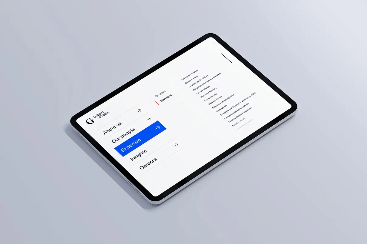Tablet displaying a website menu with highlighted 'Expertise' section and a list of services.