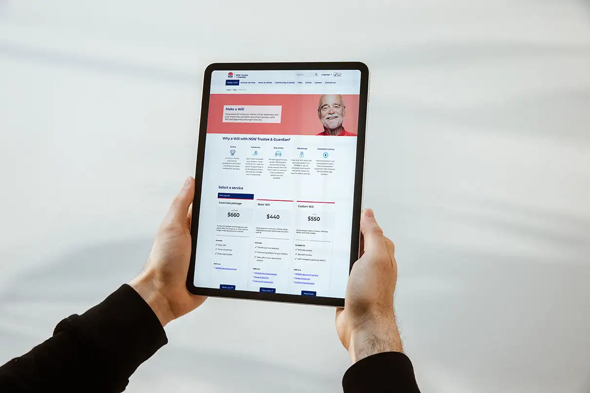 Tablet screen showing NSW Trustee & Guardian service comparison page designed with the NSW digital guidelines.