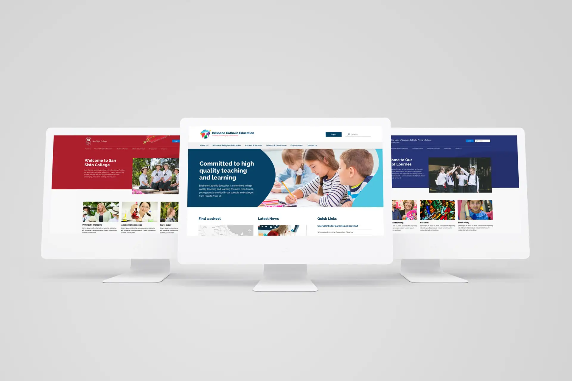 Three desktop monitors presenting different Brisbane Catholic Education school website homepages in red, blue and navy themes.