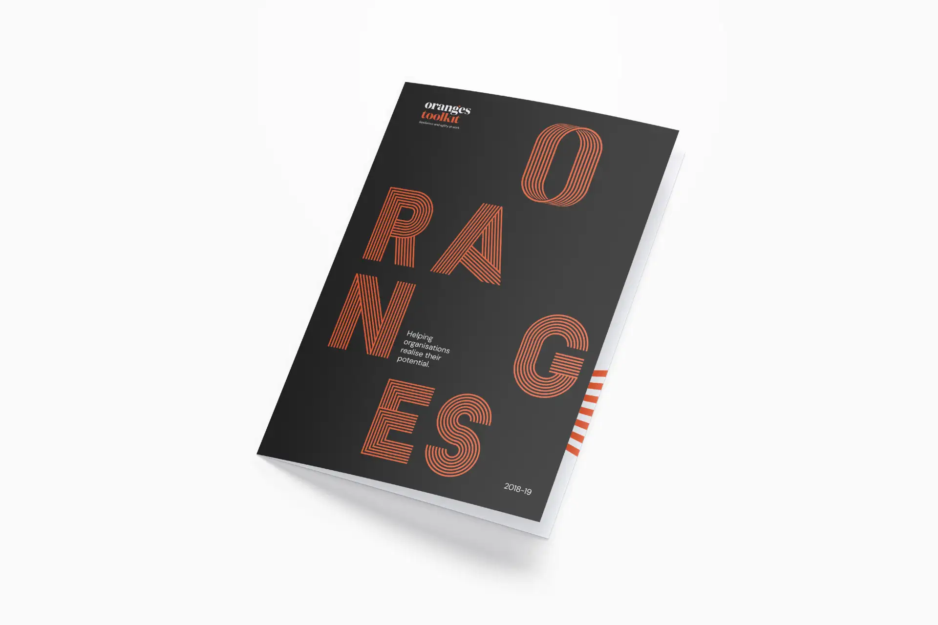 Black booklet titled 'oranges toolkit' with large orange striped letters spelling ORANGES scattered across the cover.